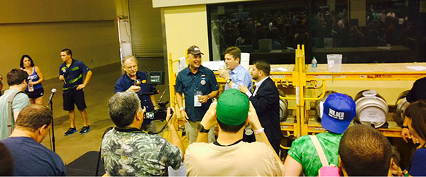 Mayor Greg Stanton and U.S. Rep. Ruben Gallego tap a keg at the Real, Wild & Woody Beer Festival.
