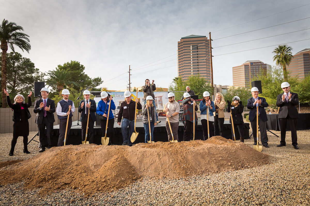 Denise D. Resnik, First Place Founder; and Phoenix Mayor Greg Stanton join adults with autism in breaking ground on First Place-Phoenix. Photo credit: Stephen G. Dreiseszun/Viewpoint Photographers